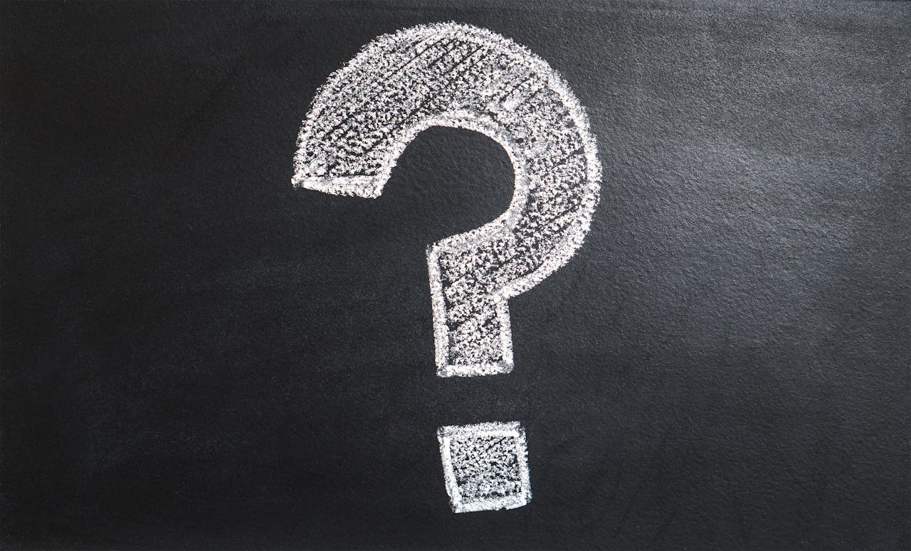 The Art of Drawing Readers In: Your attractive post title goes here A conceptual image featuring a question mark drawn on a chalkboard, ideal for problem-solving contexts.